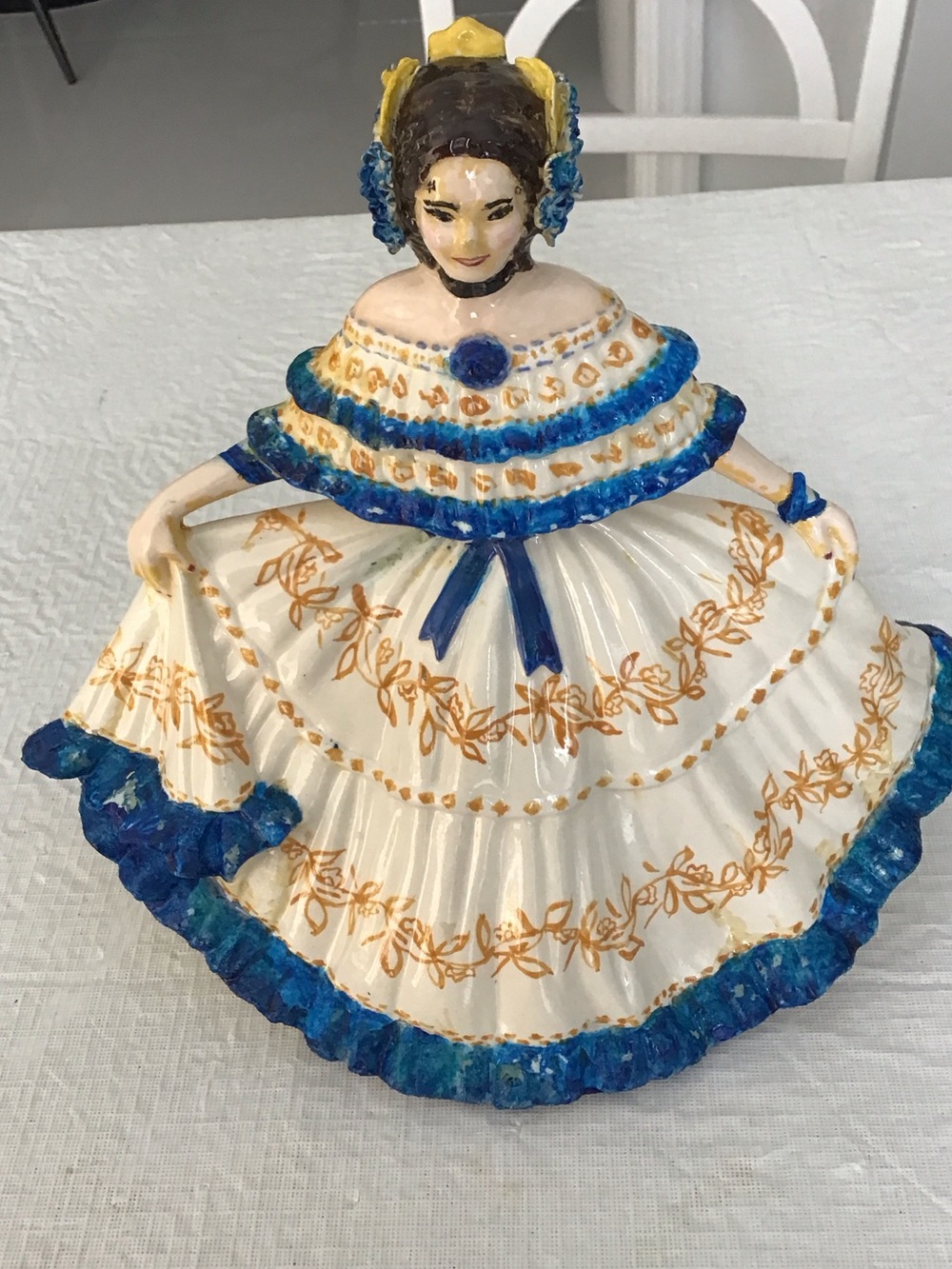 Hand-Painted Porcelain Figurine in White and Blue with Gold Accents